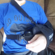 Very serious and bulky sling that makes it look like I’m wearing a seatbelt